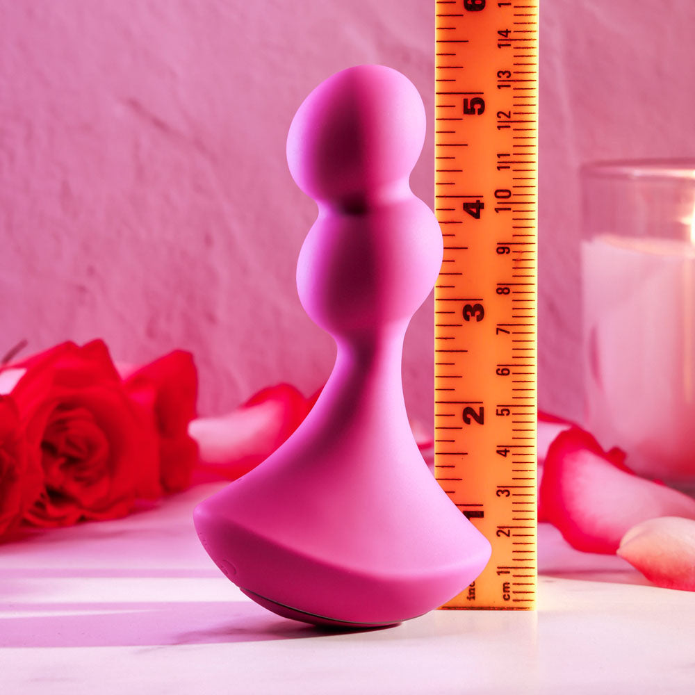 Gender X BALL GAME -  13.5 cm USB Rechargeable Vibrating Butt Plug next to ruler for size reference.