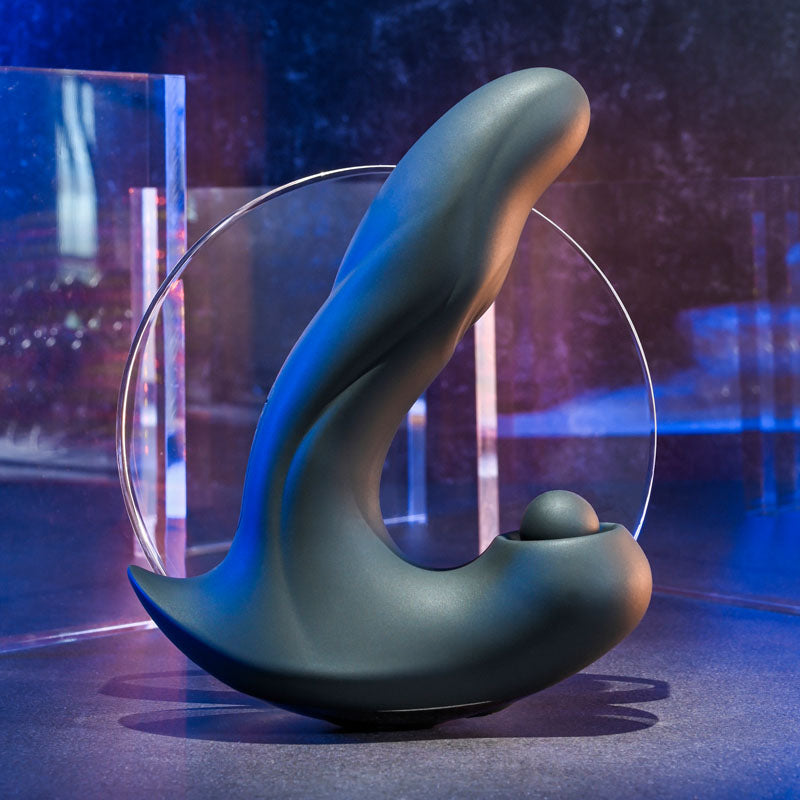 Gender X MAD TAPPER -  USB Rechargeable Double Tapping Vibrating Massager displayed on a sleek surface with a modern design.