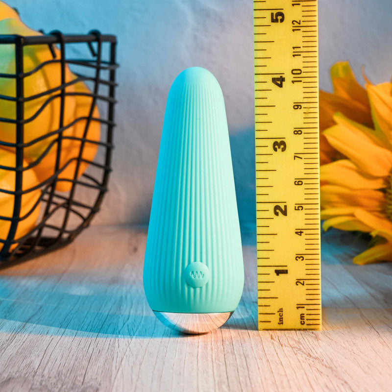 Gender X O-CONE - 10.8 cm (4.25'') USB Rechargeable Bullet next to a ruler for size reference.