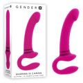 Gender X SHARING IS CARING rechargeable strap-on vibrator in vibrant pink, showcasing the unique design and dual-motor features.