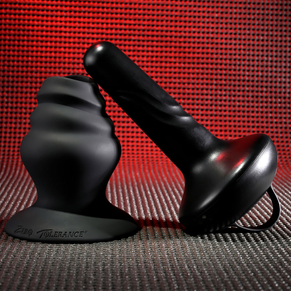 Gender X ECHO - 15.3 cm USB Rechargeable Butt Plug displayed against a textured background, highlighting its sleek design.