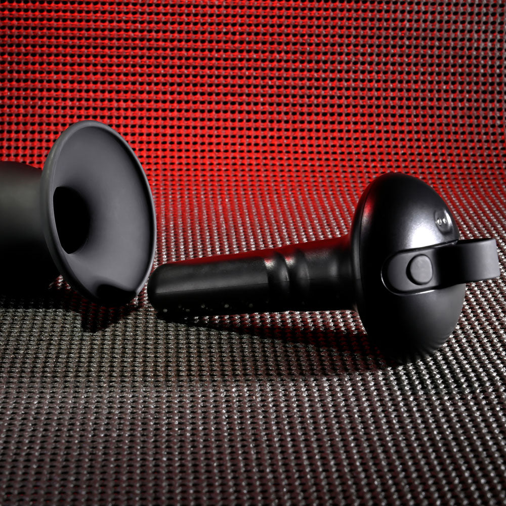 Gender X ECHO - 15.3 cm USB Rechargeable Butt Plug on a textured background.
