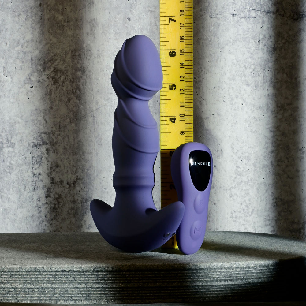 Gender X RING IT -  16.5 cm USB Rechargeable Vibrator with Wireless Remote next to a ruler for size reference.