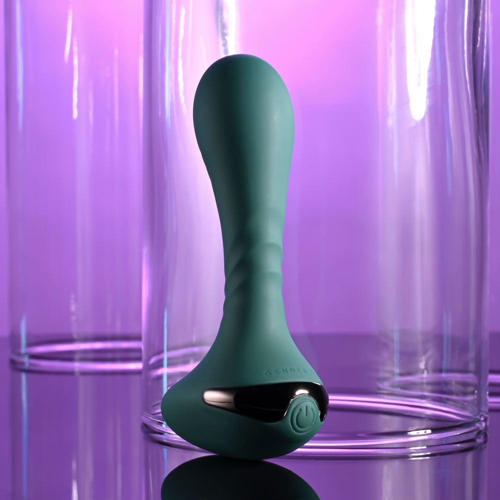 Gender X GOES ANYWHERE -  12.4 cm USB Rechargeable Vibrator on display with a vibrant purple background.