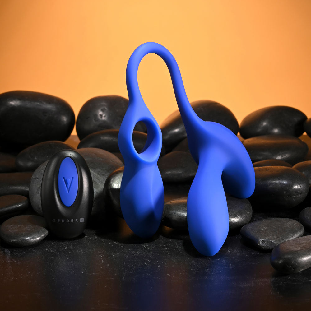 Gender X BACK FOR MORE - Dual USB Rechargeable Dual Stimulator with Wireless Remote on smooth stones.