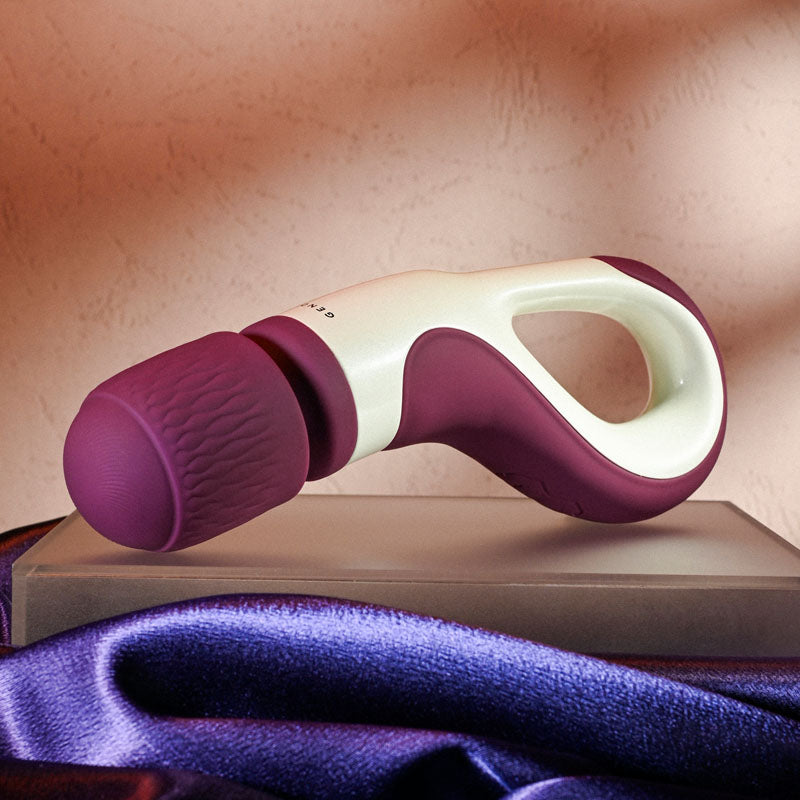 Gender X HANDLE IT - /White USB Rechargeable Massager Wand on display with a textured head and ergonomic handle.