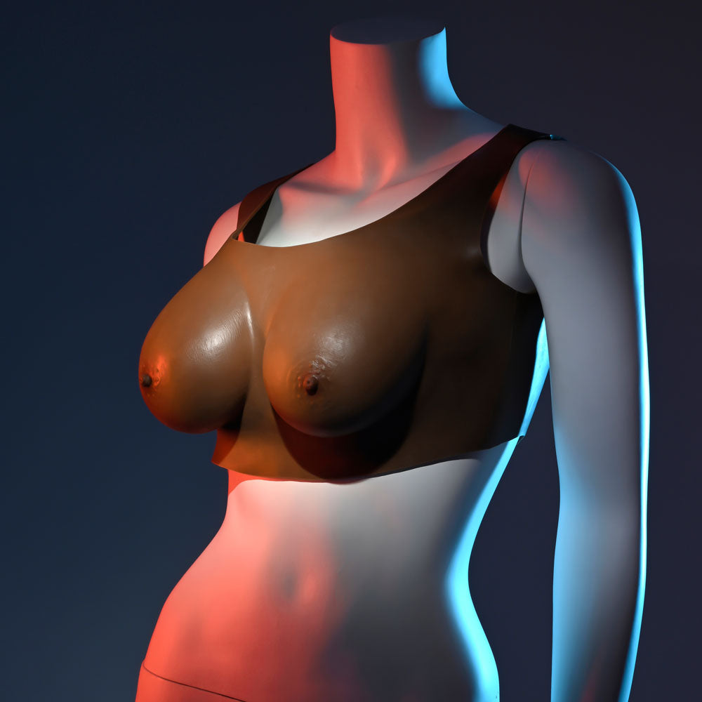 Gender X UNDERGARMENTS - PLATE C-CUP - Dark -  Wearable Breasts - C-Cup Size on a mannequin with dramatic lighting.