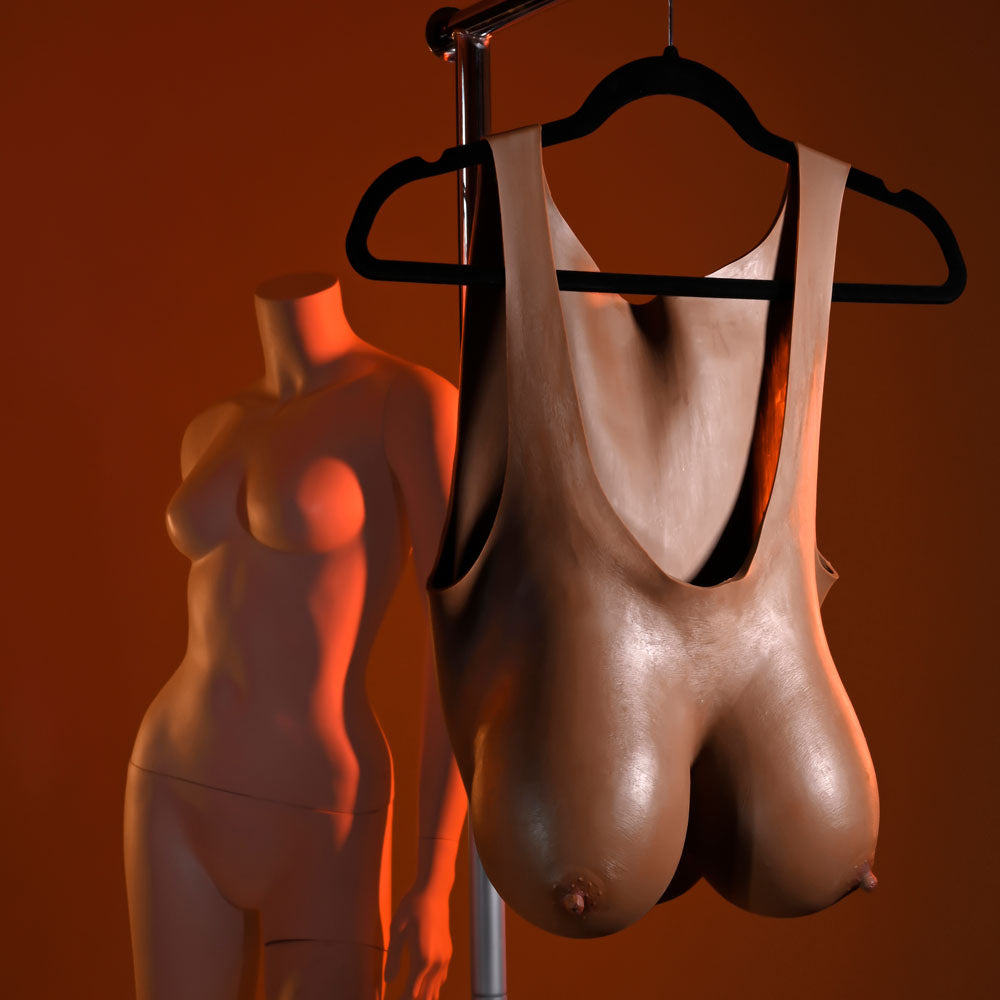 Gender X UNDERGARMENTS - PLATE E-CUP - Dark -  Wearable Breasts - E-Cup Size on display with mannequin in the background.