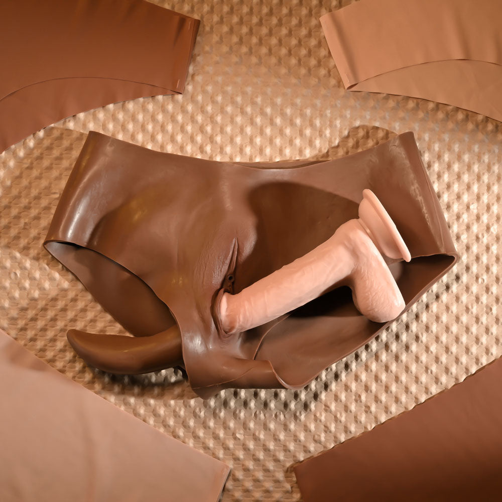 Gender X UNDERGARMENTS - BRIEFS - Dark -  Wearable Vagina Briefs displayed on a textured surface with realistic features.