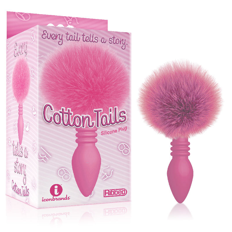 The 9's Cottontails, Ribbed - Butt Plug with Bunny Tail in vibrant pink packaging.