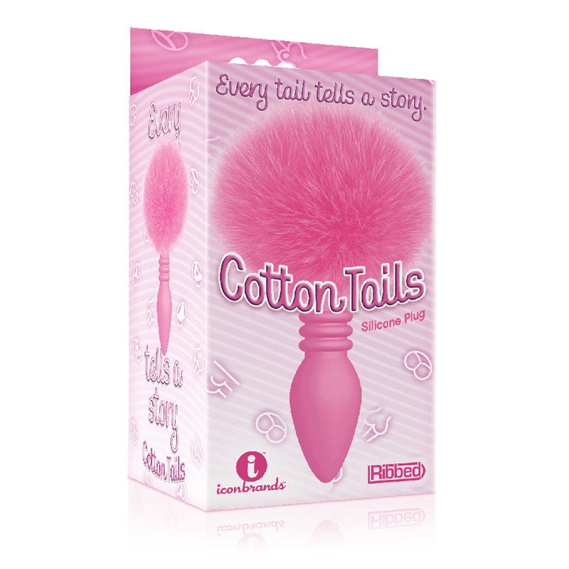 The 9's Cottontails, Ribbed  -  Butt Plug with Bunny Tail, vibrant pink silicone plug in box design.