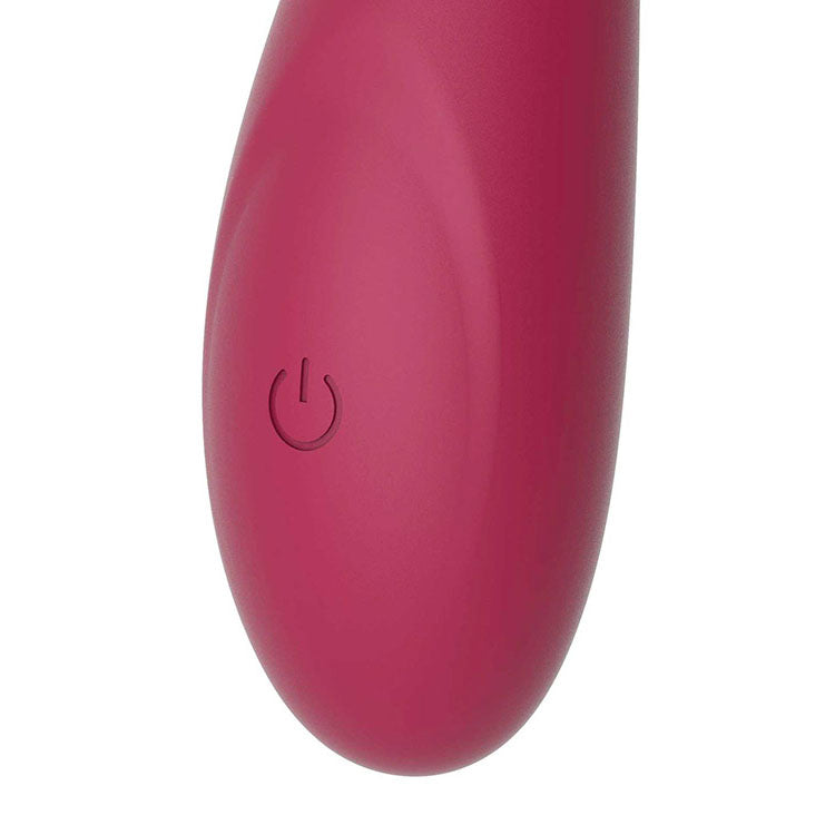 Close-up of the Adam & Eve INFINITY - USB Rechargeable Bendable Vibrator power button in vibrant pink.