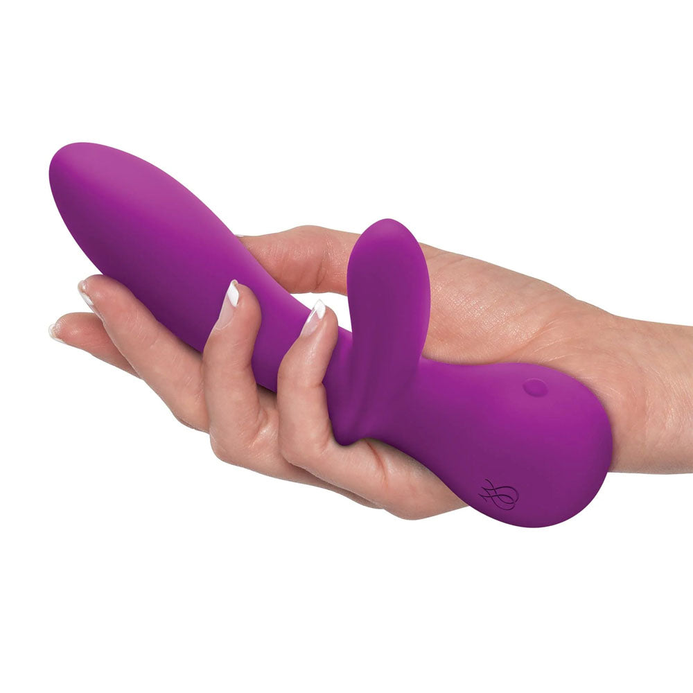 JimmyJane G-Rabbit - 17.6 cm USB Rechargeable Vibrator in hand showcasing its ergonomic design and flexible clitoral stimulator.