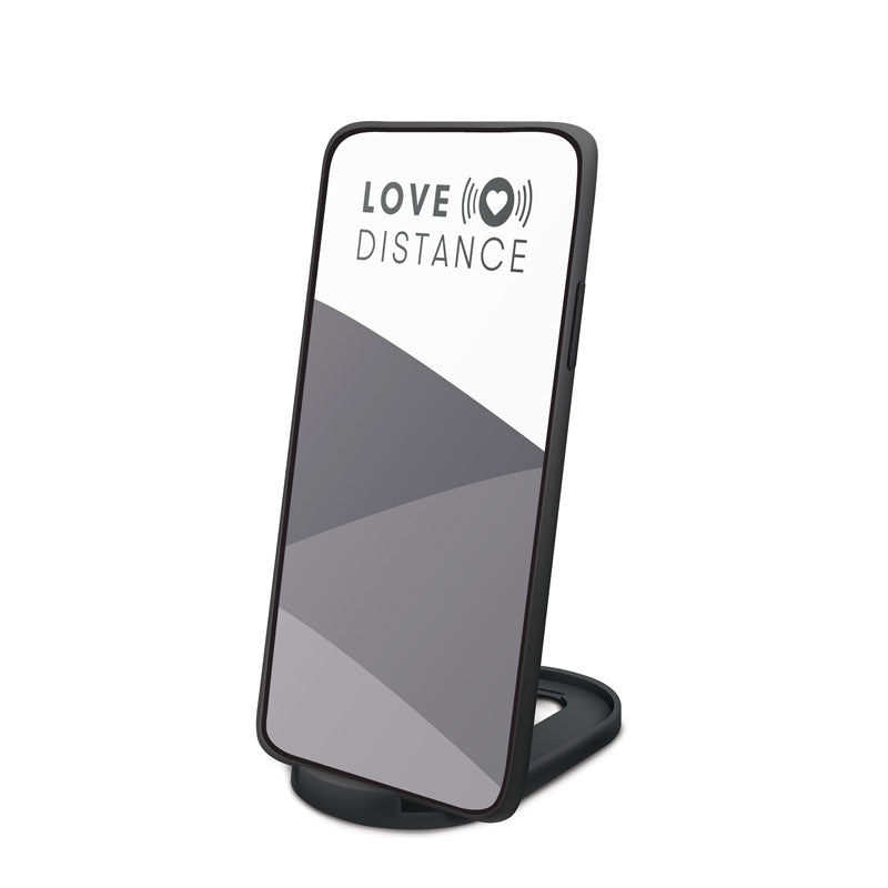 Smartphone displaying Love Distance MAG -  Rechargeable Panty Vibrator with App Control logo on a sleek stand.