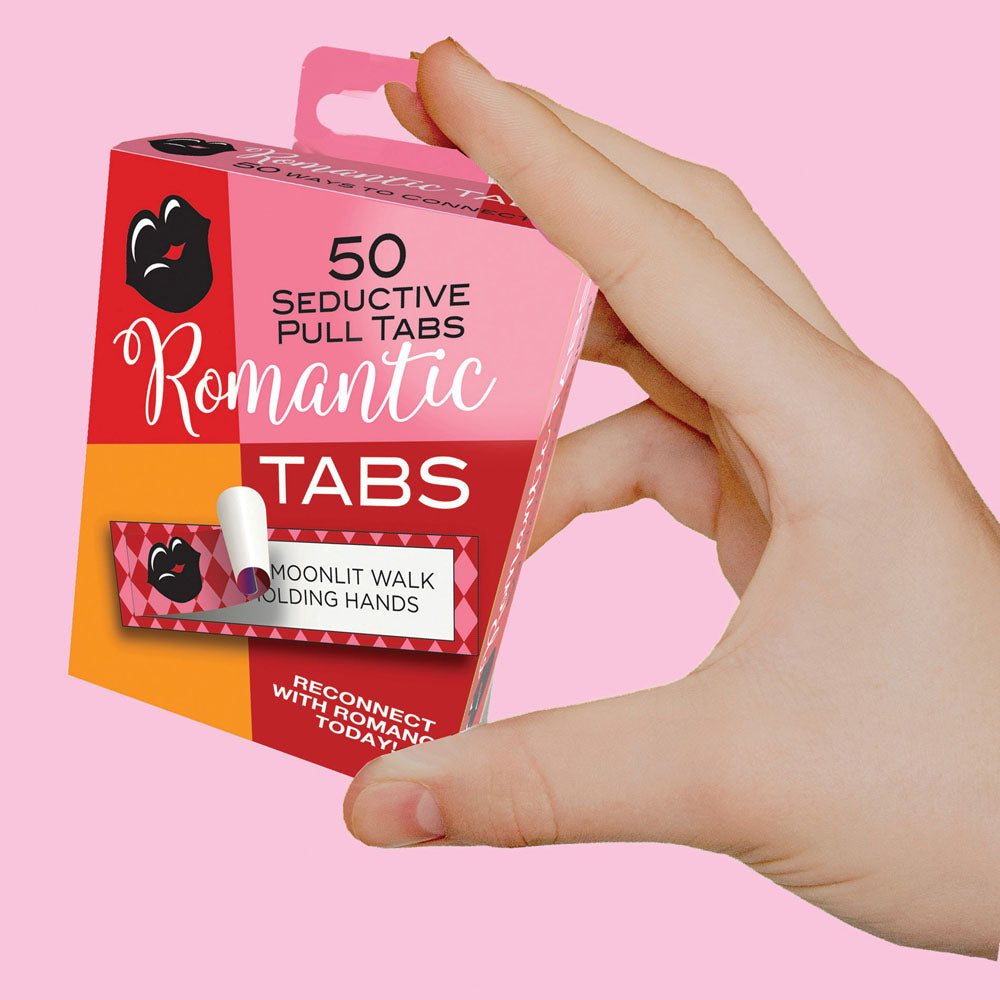 Romantic Tabs - Romantic Suggestions - Set of 50, hand holding a box featuring 50 seductive pull tabs for romantic activities.