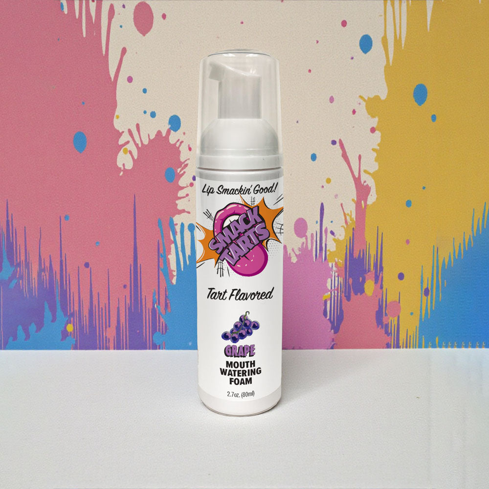 Smack Tarts sour grape oral lubricant foam in a vibrant bottle with colorful background.