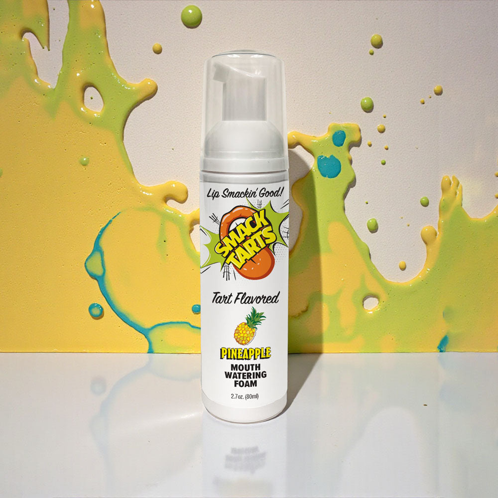 Smack Tarts pineapple flavored oral lubricant in 80 ml bottle on colorful background with foam design.