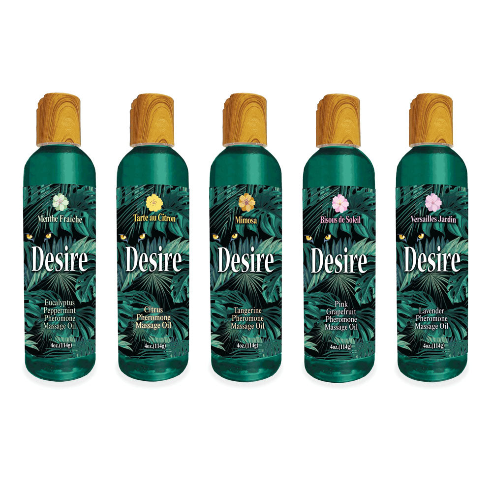 Desire Pheromone Massage Oil - Tangerine Scented Pheromone Massage Oil - 118 ml in assorted scents displayed on a table.