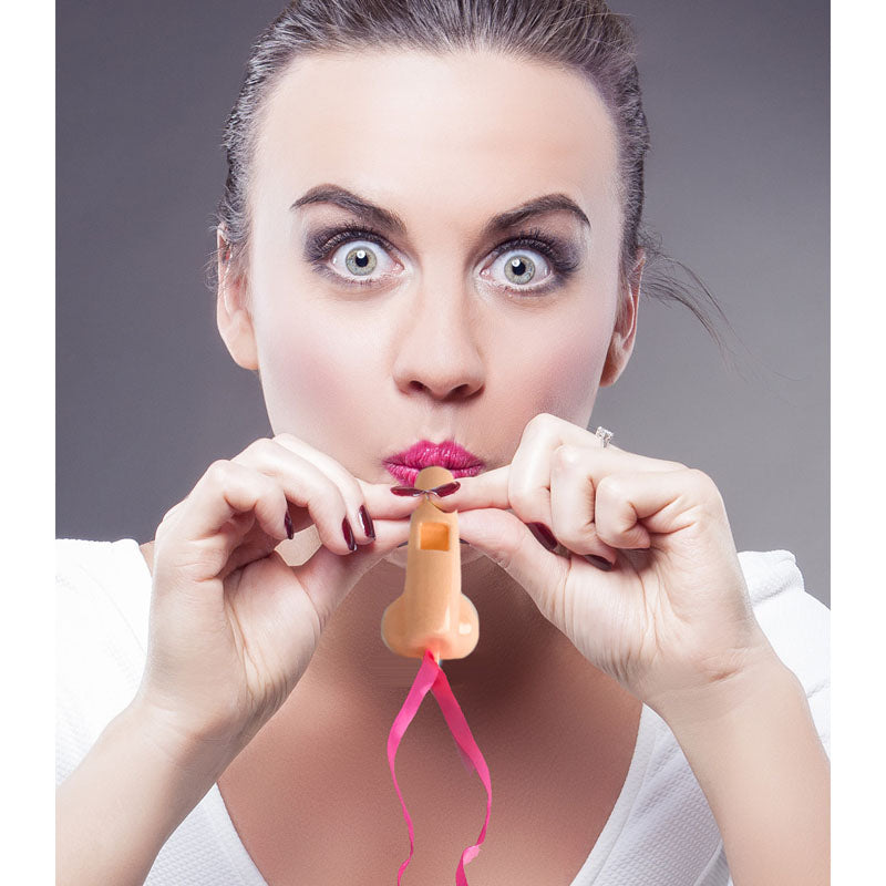 Super Fun Penis Party Whistles - Hens Party Novelties - 8 Pack, woman holding a penis-shaped whistle with pink lanyard.