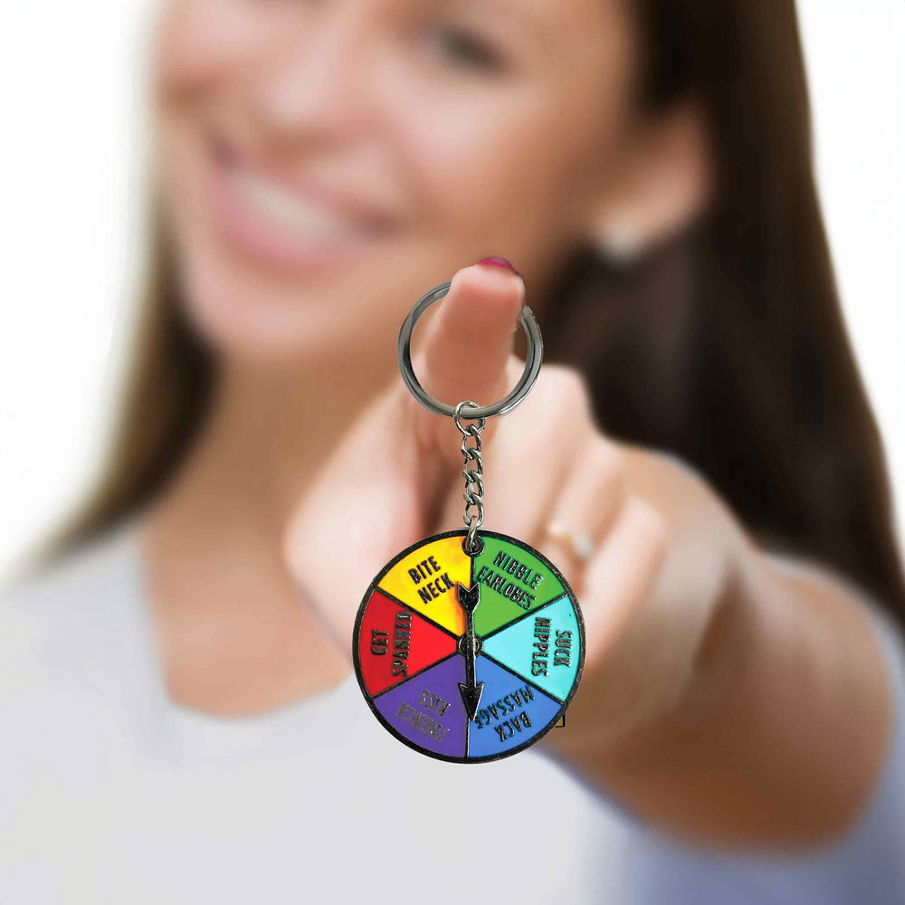 Super Fun Key Chain - Sex Spinner - Naughty Spinner Novelty Keychain featuring a colorful spinning wheel and playful text.