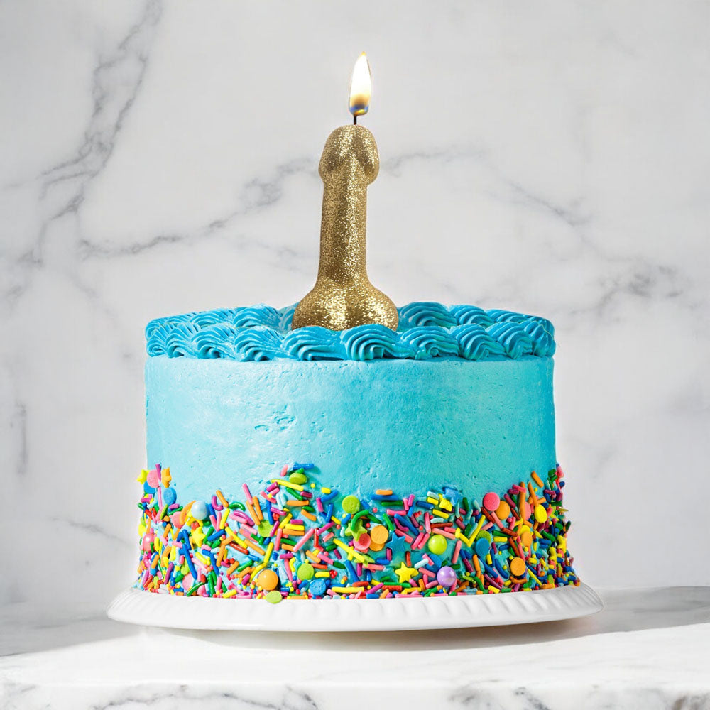 Glitterati Gold Glitter Penis Candle - Gold 10 cm Penis Party Candle on a colorful cake with sprinkles.