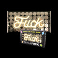 Fuck Neon Light Sign - Novelty Neon Light displayed with sparkling sequin background and packaging.