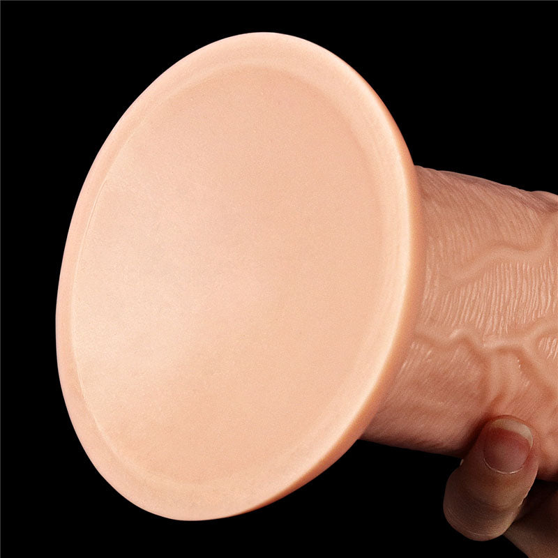 Close-up of the base of the King Size 11'' Realistic Dildo - 28 cm Dong, showcasing its lifelike texture and sturdy design.