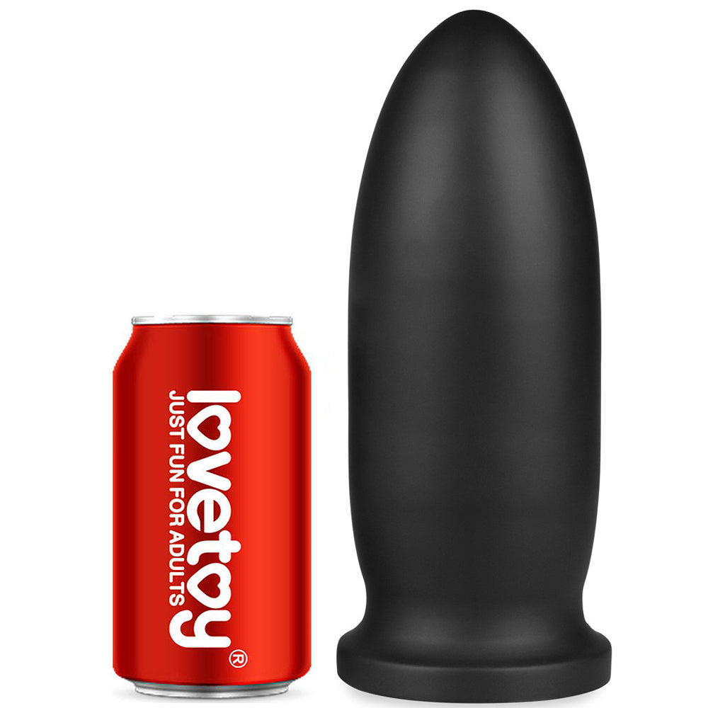 King Sized Anal Bomber - 23 cm (9'') Mega Anal Plug next to a soda can for size comparison.