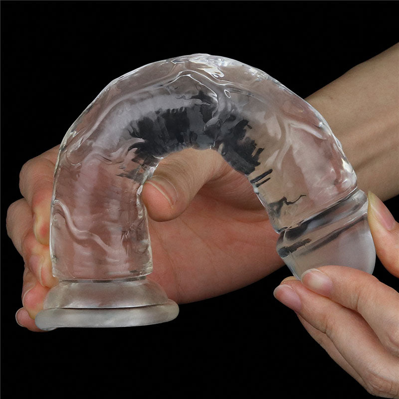 Flawless Dildo 7'' -  17.8 cm Dong held in hand, showcasing its realistic design and suction cup base.