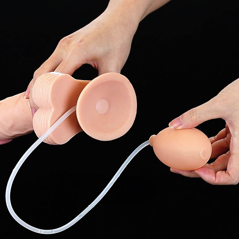 Squirting dildo with balls, showcasing the suction cup and squirting mechanism in use.