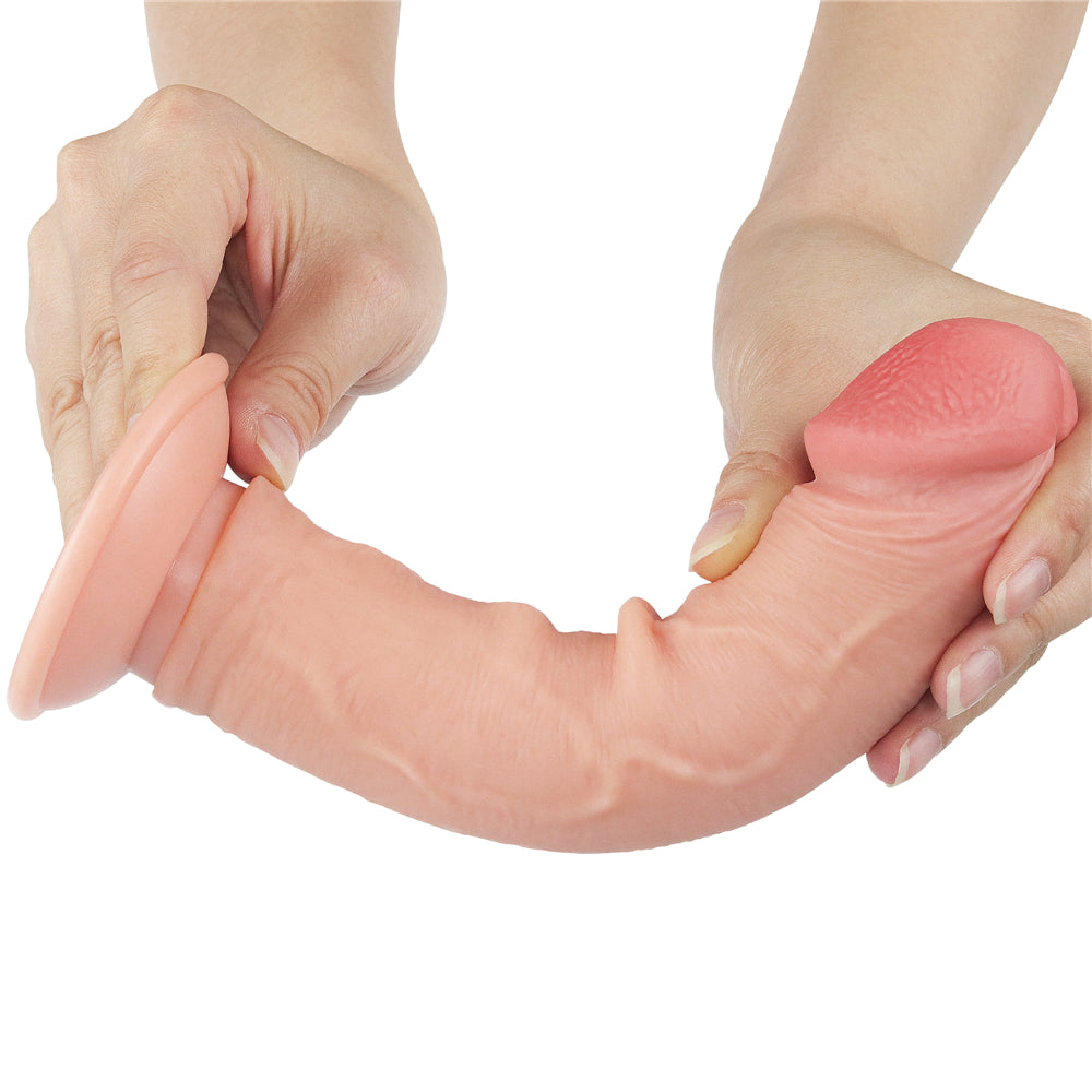 Sliding Skin Dual Layer Dong - 20 cm (8'') Dong with Flexible Skin being held to show realistic design and flexibility.