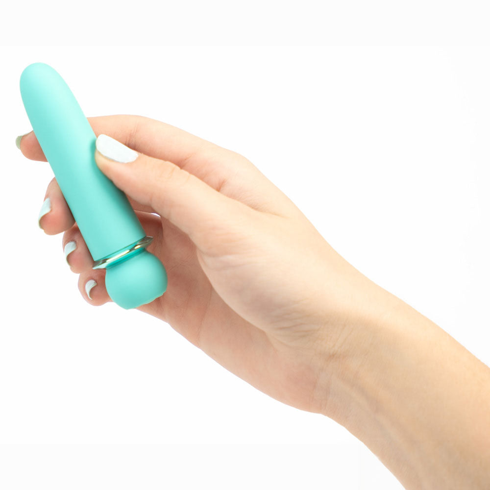 Maia JAGUAR -  -  10.1 cm USB Rechargeable Bullet held in a hand, showcasing its sleek design.