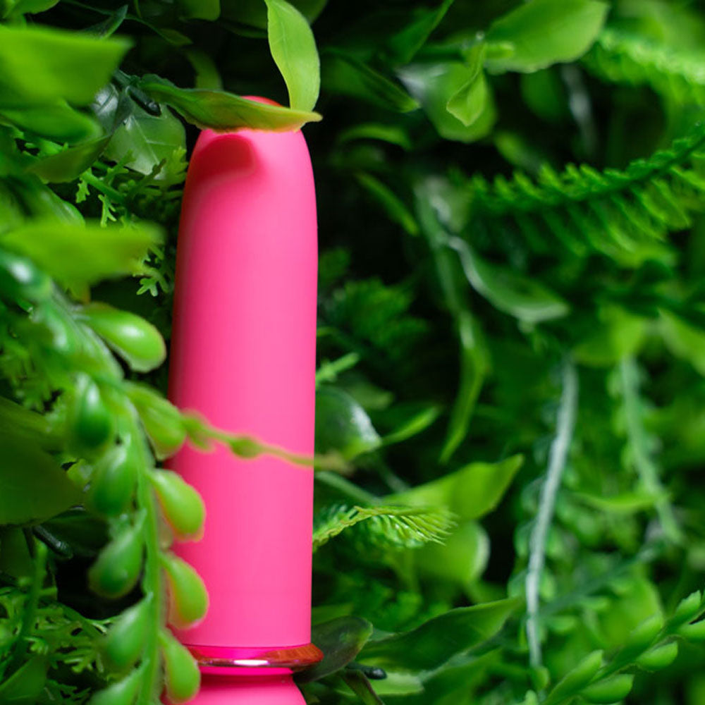 Maia JAGUAR -  -  10.1 cm USB Rechargeable Bullet surrounded by lush greenery.