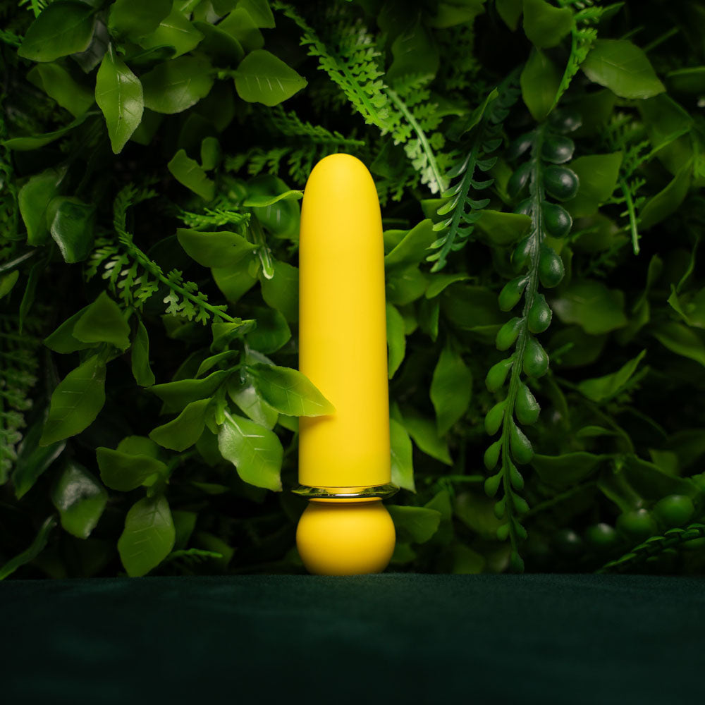 Maia JAGUAR -  -  10.1 cm USB Rechargeable Bullet against a backdrop of lush green foliage.