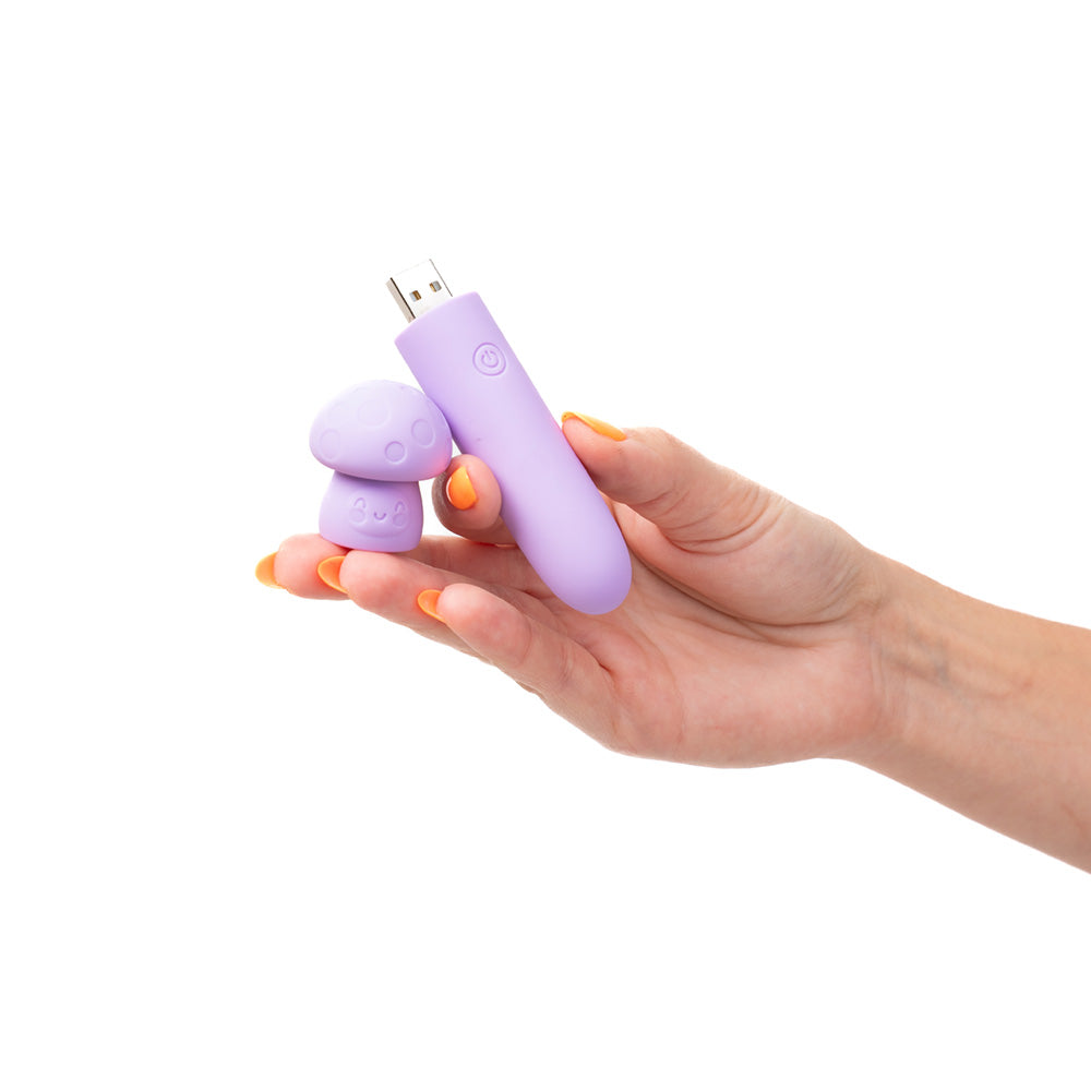 Maia HAPPI - 11.1 cm USB Rechargeable Bullet in hand showcasing its compact design and USB connector.