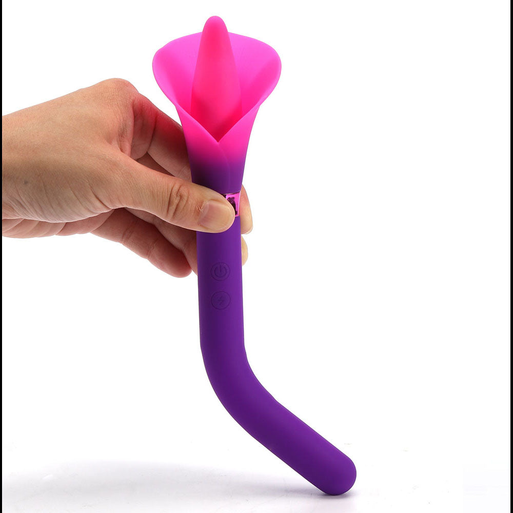 Maia VALA -  - /Pink 22.2 cm USB Rechargeable Flower Vibrator held in hand, showcasing its unique flower design.