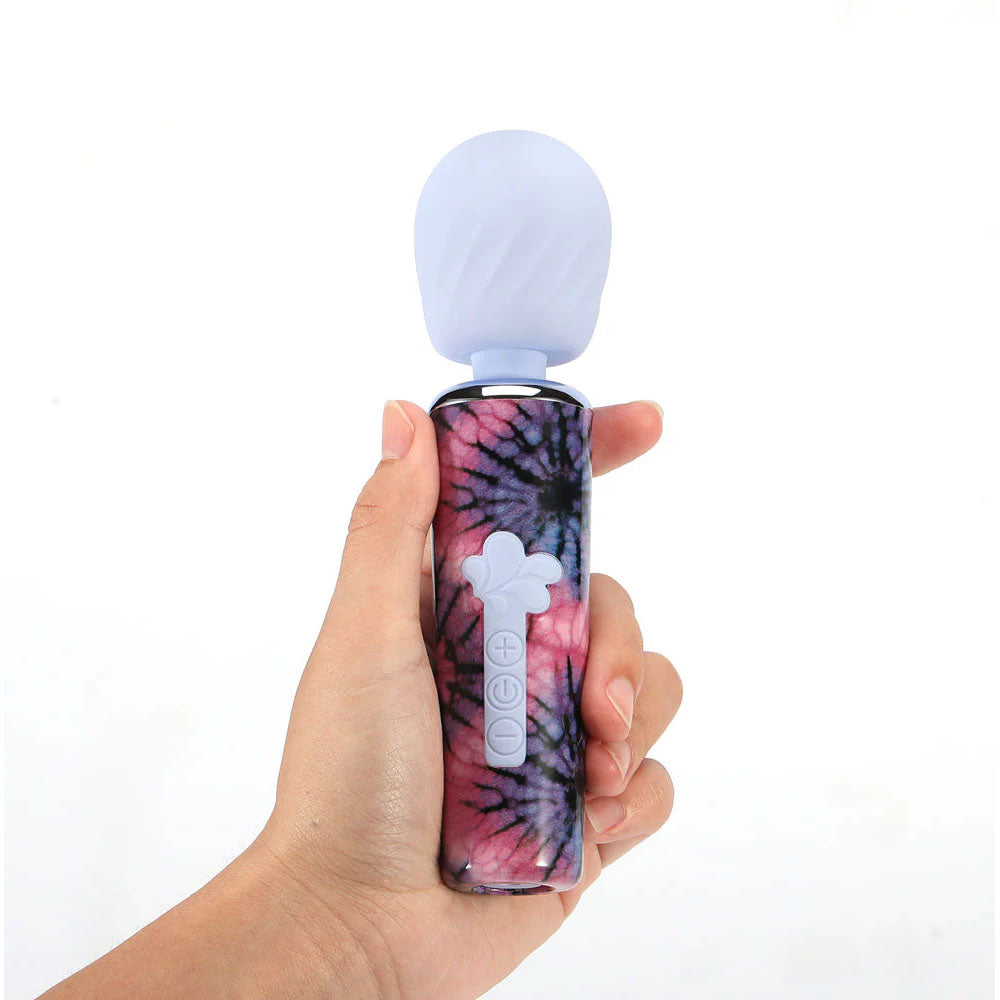 Maia JOURNEE Wand -  15.9 cm USB Rechargeable Massage Wand held in hand, featuring a vibrant tie-dye design.