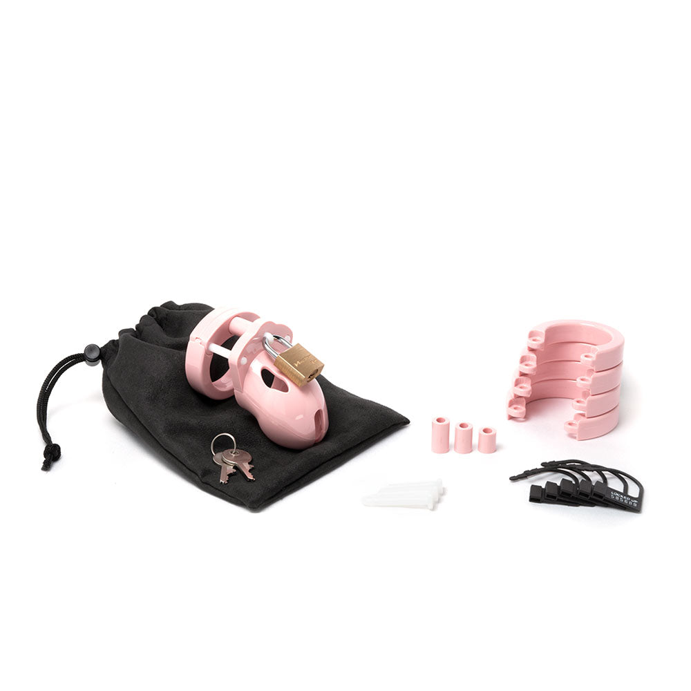 Mr. Stubb Chastity Cock Cage Kit -  -  1.75 Inch Cock Cage Kit with pink cage and accessories.
