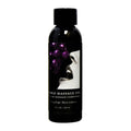 Edible Massage Oil - Gushing Grape Flavoured - 59 ml Bottle, featuring a sleek black design and grape graphics.