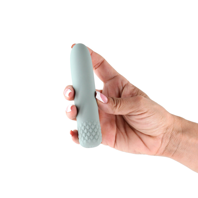 Lust-n-Dreams - Mambo - Sage - 12.2 cm USB Rechargeable Bullet in hand, showcasing sleek silicone design.