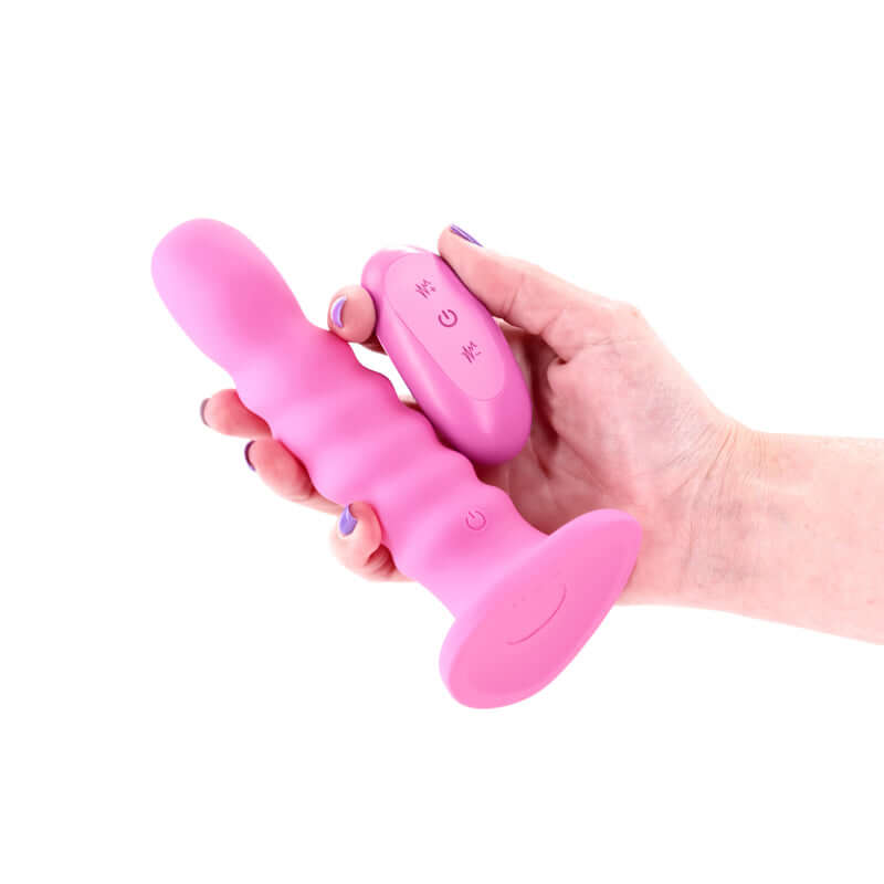 Pink 6-inch USB rechargeable vibrating dildo with ribbed shaft and wireless remote control.