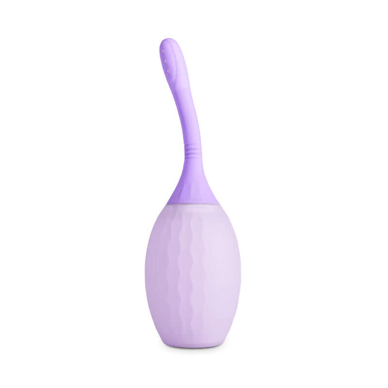 INYA Refresh unisex intimate hygiene douche with anti-backflow design in lavender color.