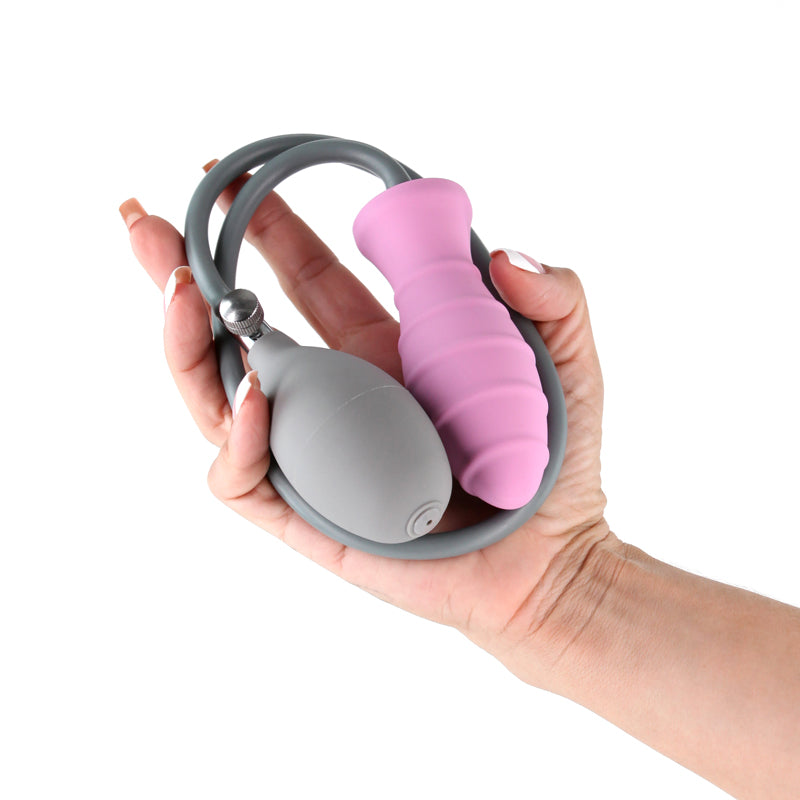 INYA InflataPlay -  -  10.5 cm Inflatable Butt Plug held in hand with inflatable pump, pink body-safe silicone.