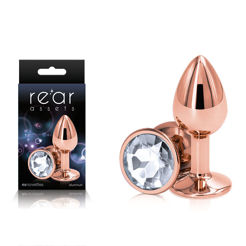 Rear Assets Rose Gold Small - Rose Gold Small Metal Butt Plug with Clear Gem Base with packaging and shiny finish.