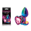 Rear Assets Multi  Heart - Multi  Small Metal Butt Plug with Pink Heart Gem Base next to packaging, colorful chrome design.