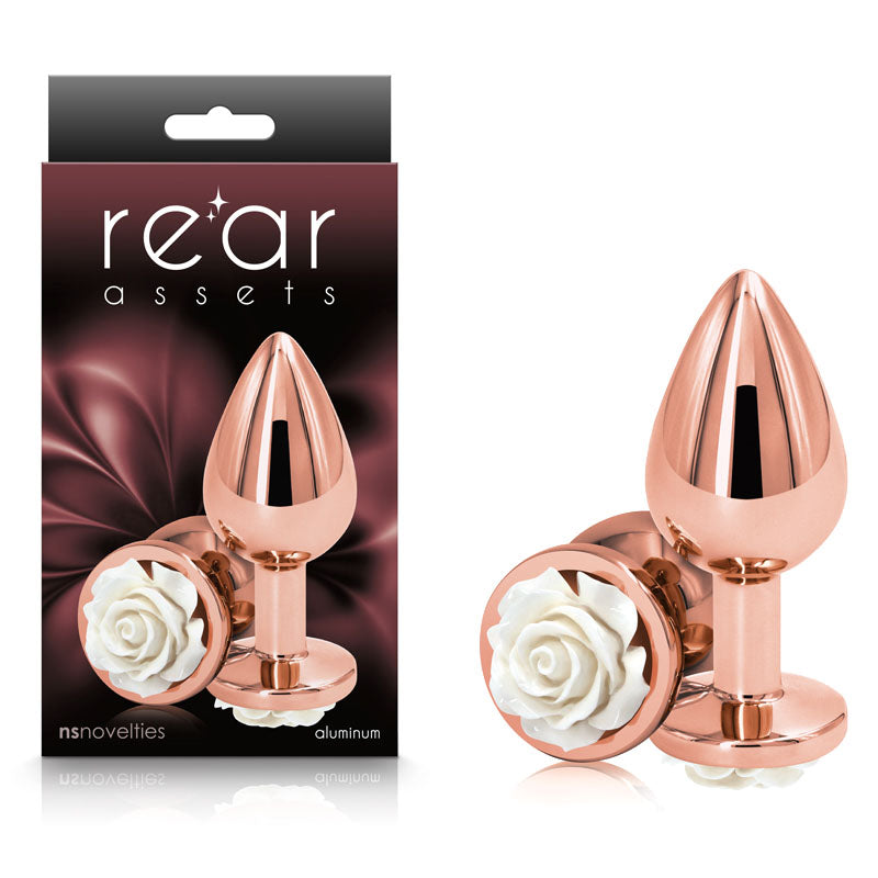 Rear Assets Rose - Medium - 8.9 cm Metal Butt Plug with White Rose Base alongside elegant packaging for intimate essentials.