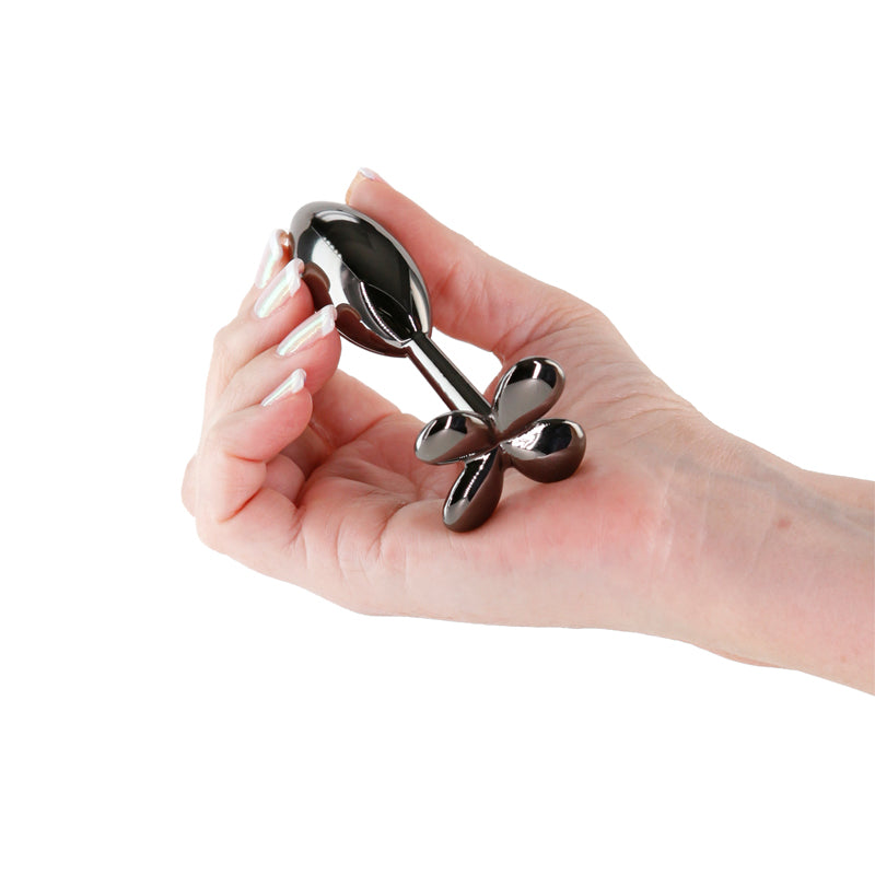 Rear Assets Clover - Gunmetal - Gunmetal 9.2 cm Metallic Butt Plug held in hand, showcasing its sleek design.