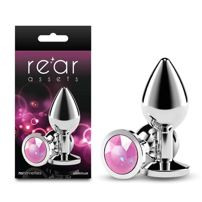 Rear Assets Silver medium pink gem anal plug with packaging, featuring chrome-plated aluminum design.