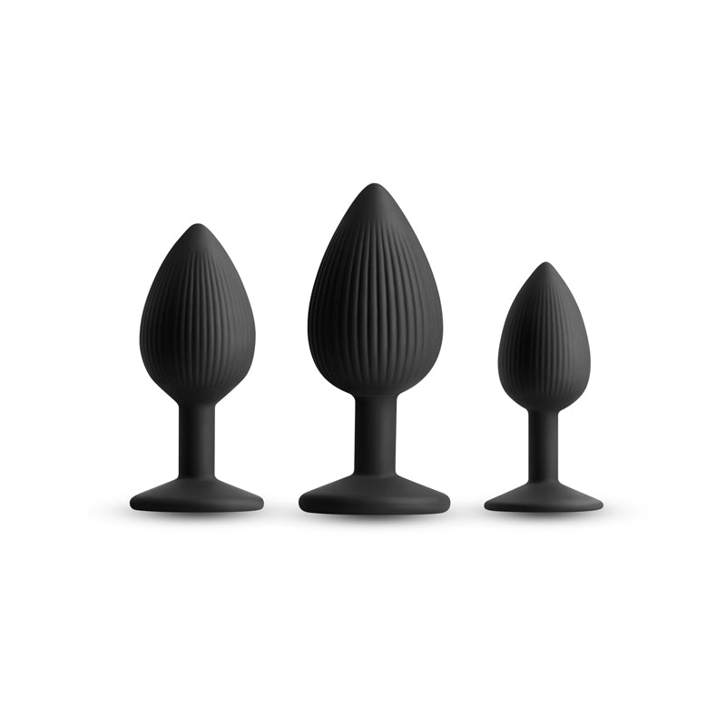 Renegade Triple Ace Kit -  -  Butt Plugs - Set of 3 Sizes in black silicone, featuring textures and lube channels.