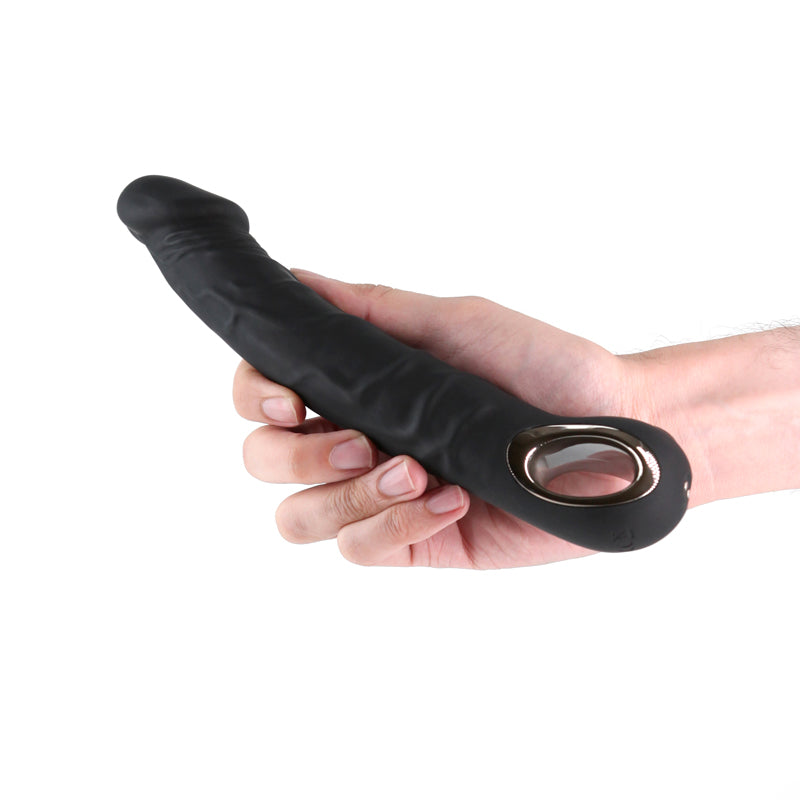 Renegade Rimmer -  -  22 cm USB Rechargeable Vibrator held in hand, featuring flexible design and body-safe silicone.
